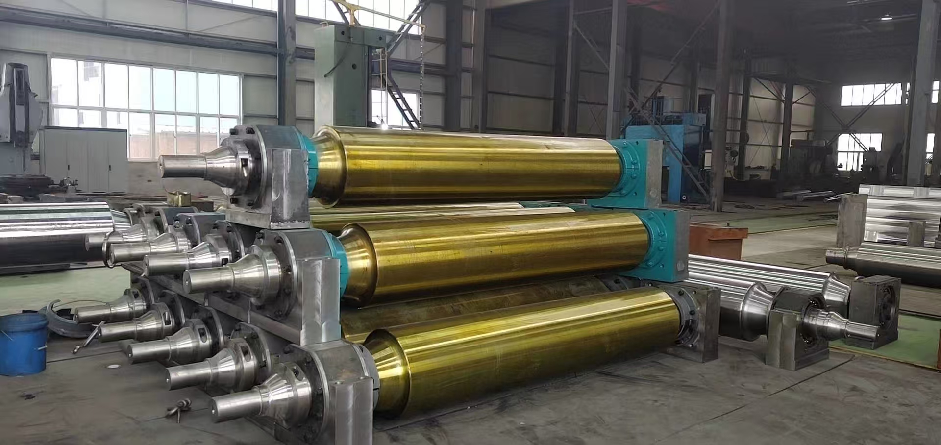 Em quais aplicações os componentes do transportador de rolos deslizantes são usados ​​principalmente?